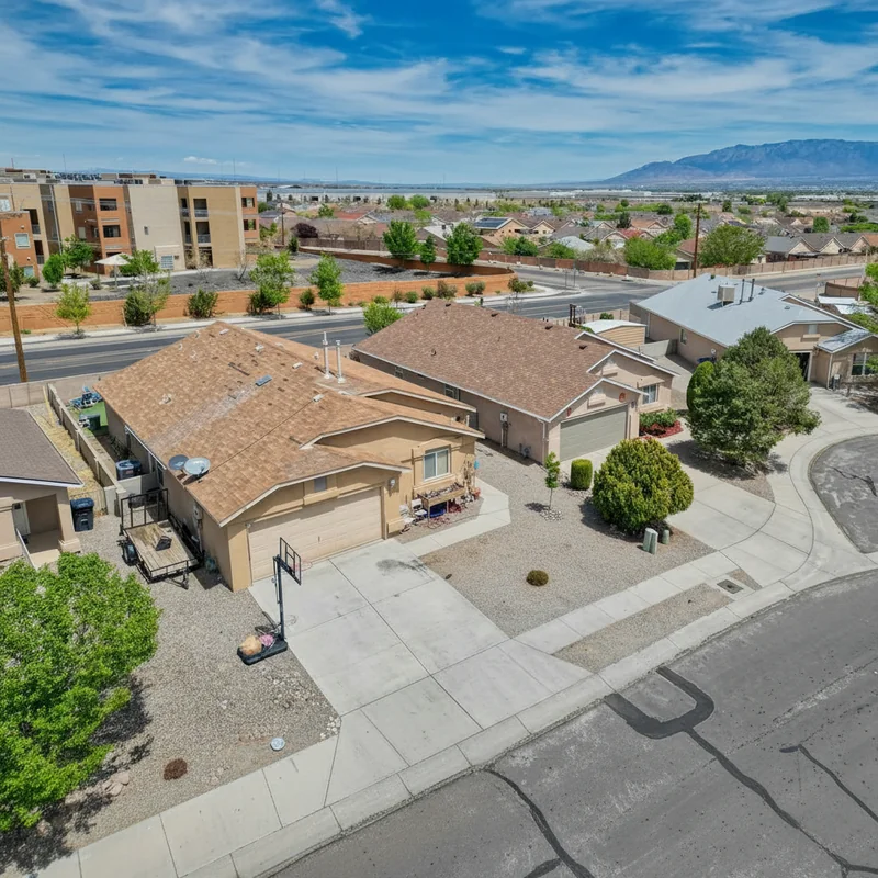 remove the cars on the drive way, and the rubbish bins next to the house, improve the over all photo quality